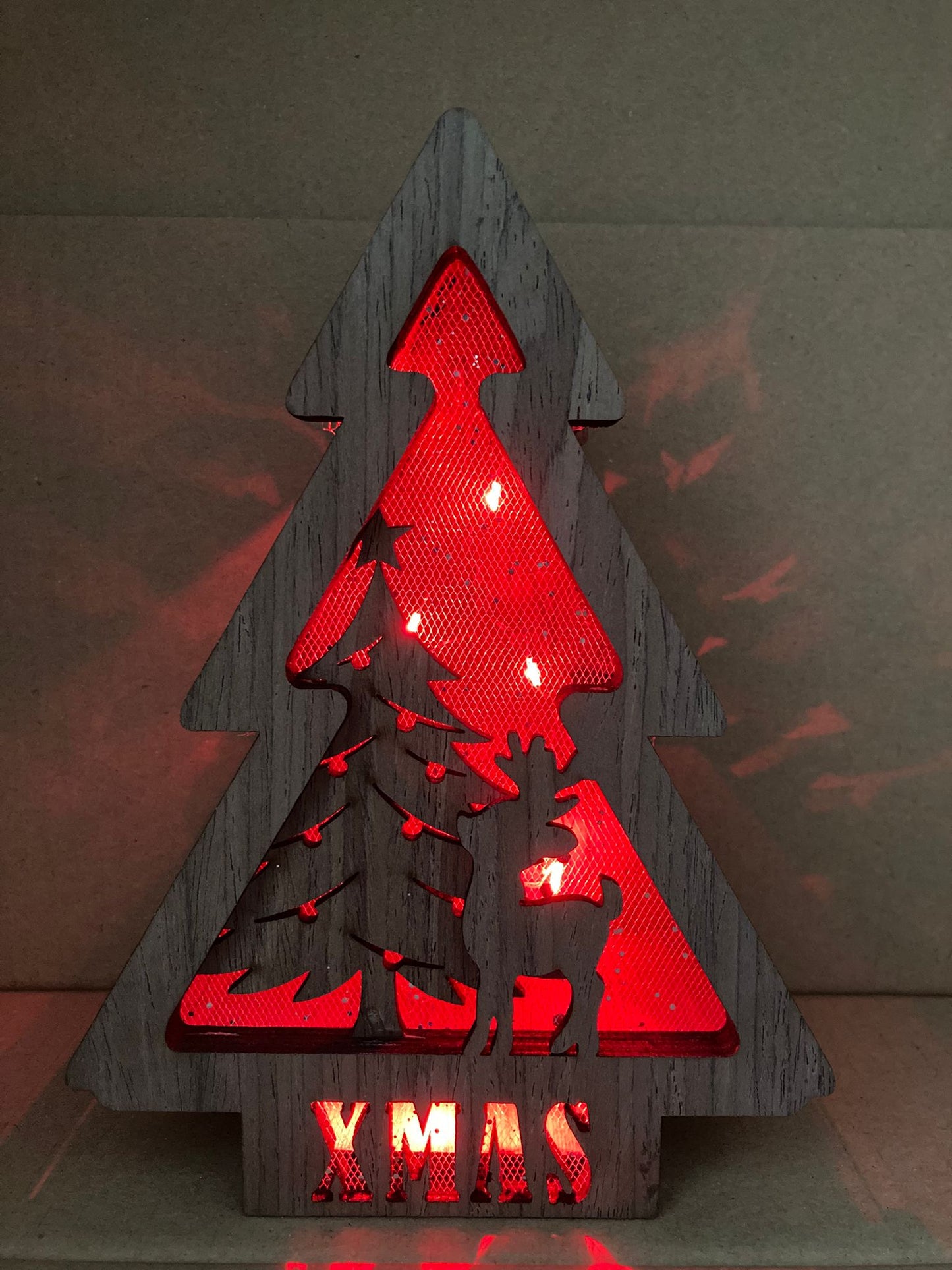 mini kerstboom met lichtjes in