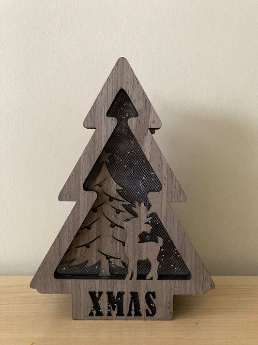 mini kerstboom met lichtjes in